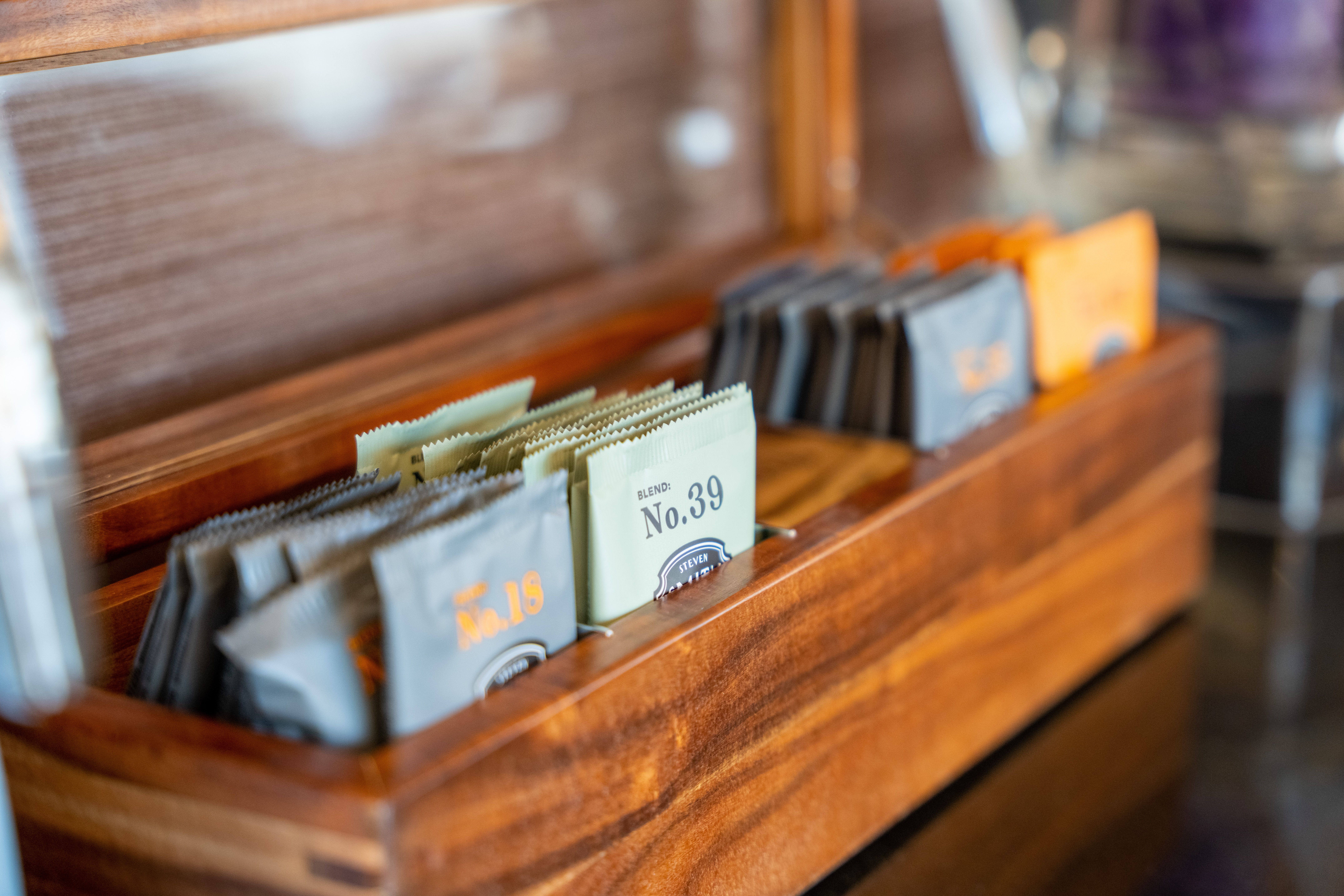 Tea packets in a tea caddy