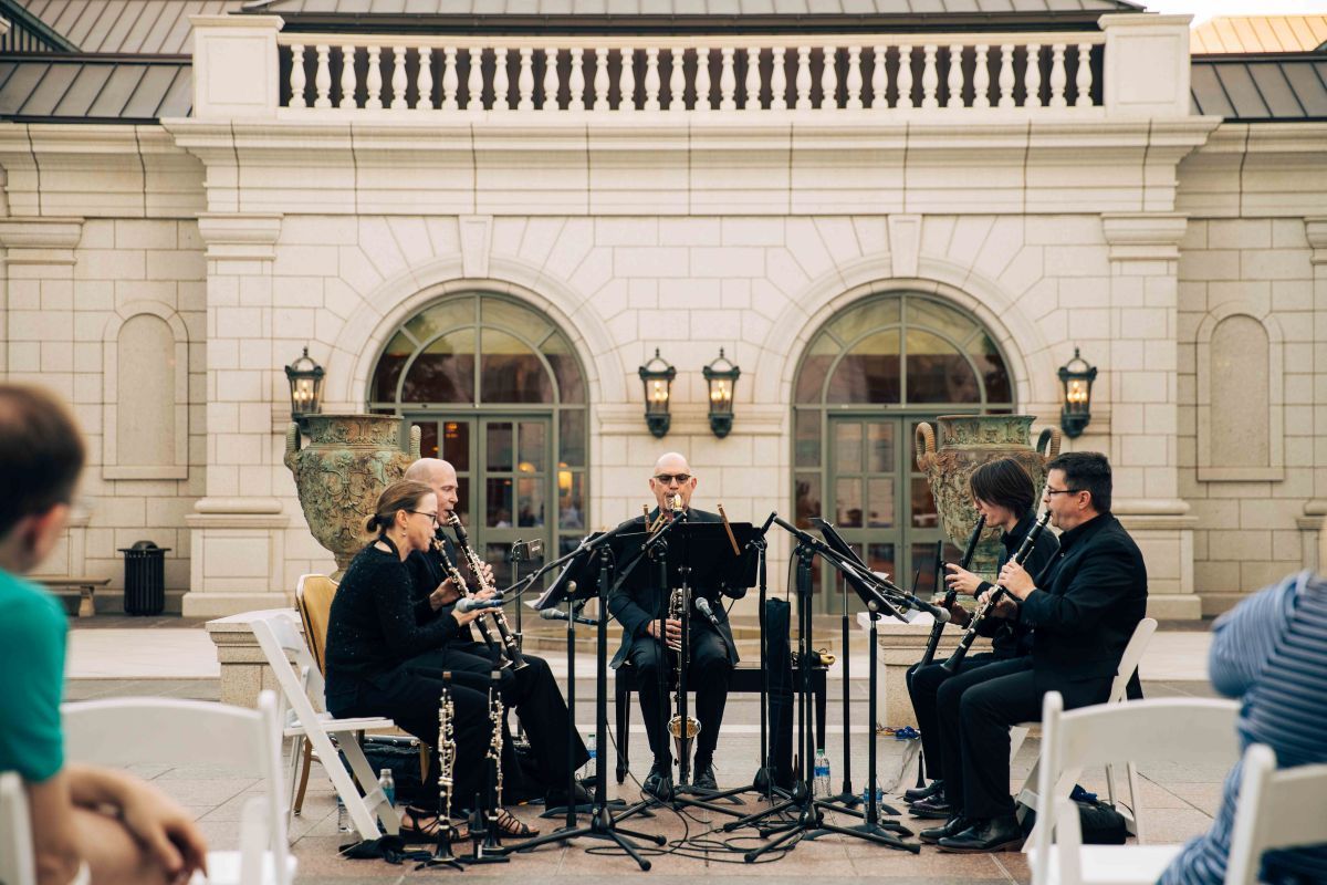 Band playing music for a group of people