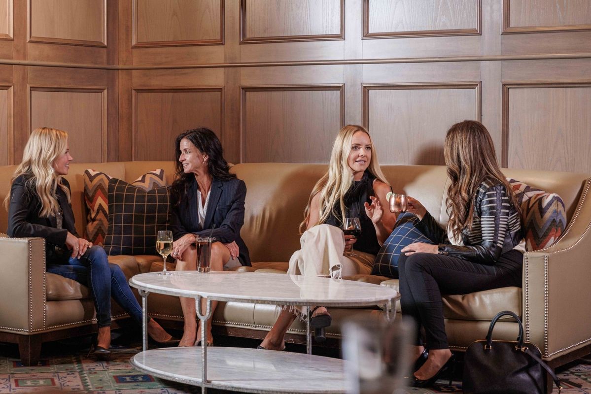 Small group of women enjoying cocktails